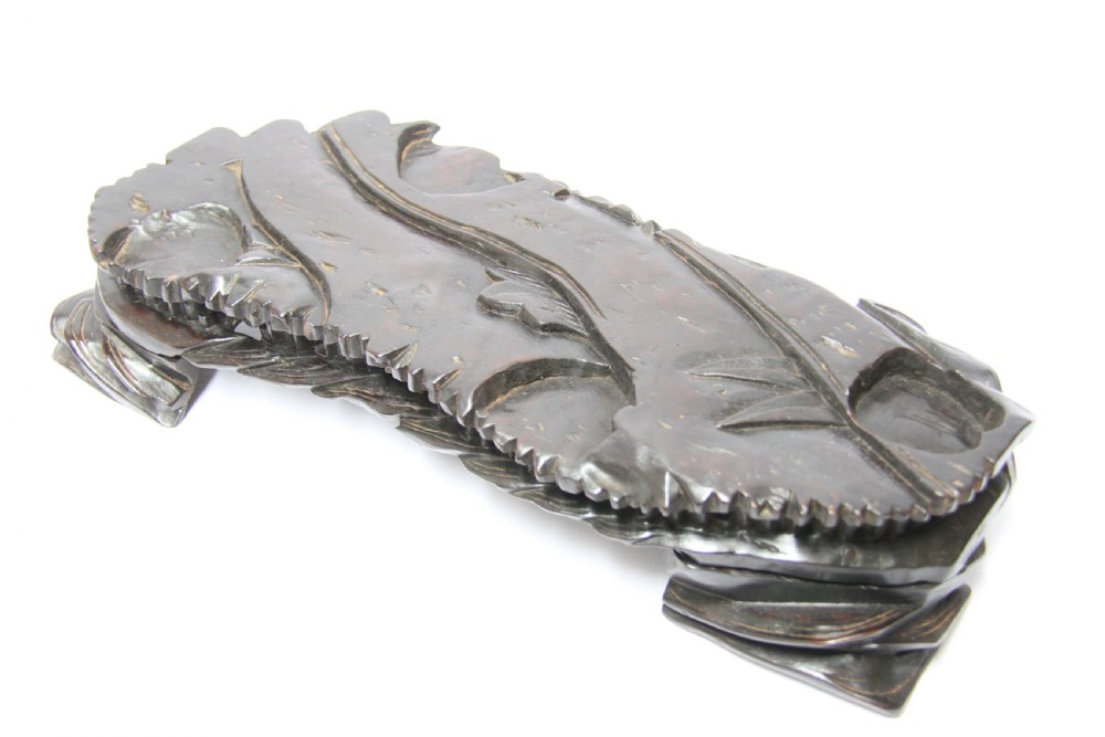 A pair of Chinese hardwood buffalo View X