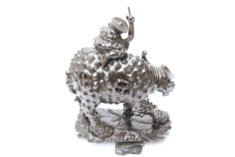 A pair of Chinese hardwood buffalo View XI