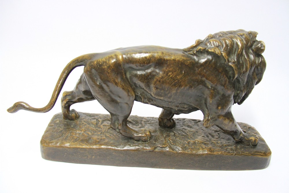 A late 19th century bronze study of a lion by Louis Vidal View III