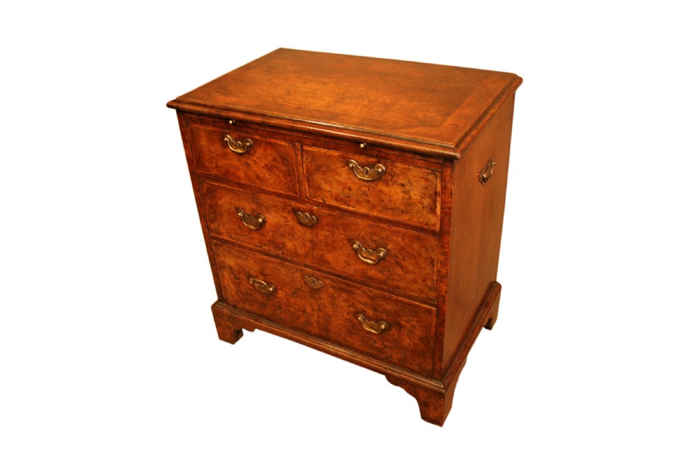 A rare small George I figured walnut Chest of Drawers View V