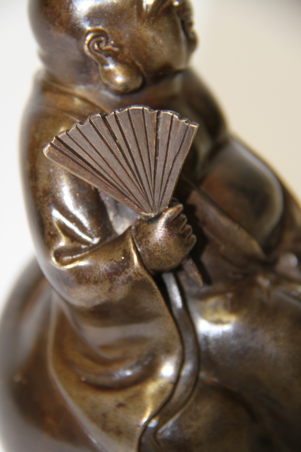 A humorous late 19th century bronze okimono  View III
