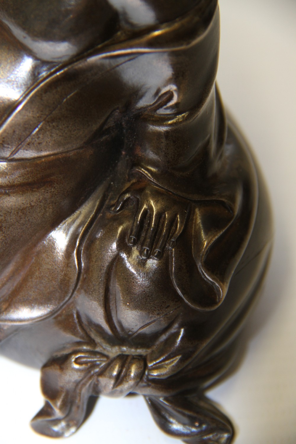 A humorous late 19th century bronze okimono  View IV