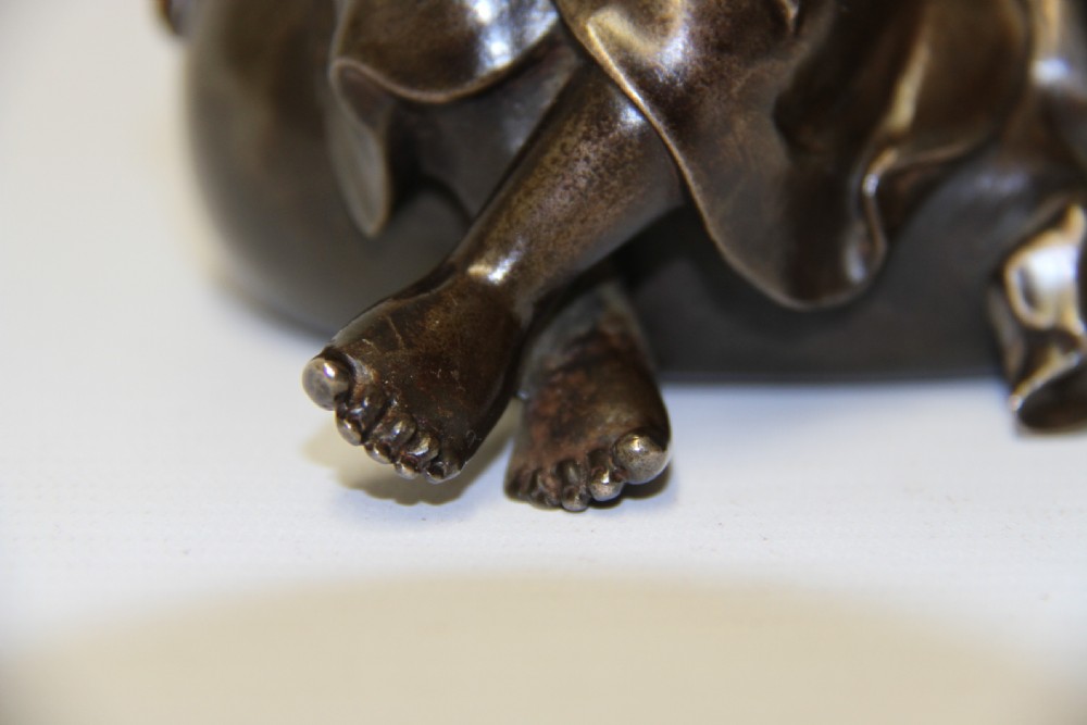 A humorous late 19th century bronze okimono  View VII