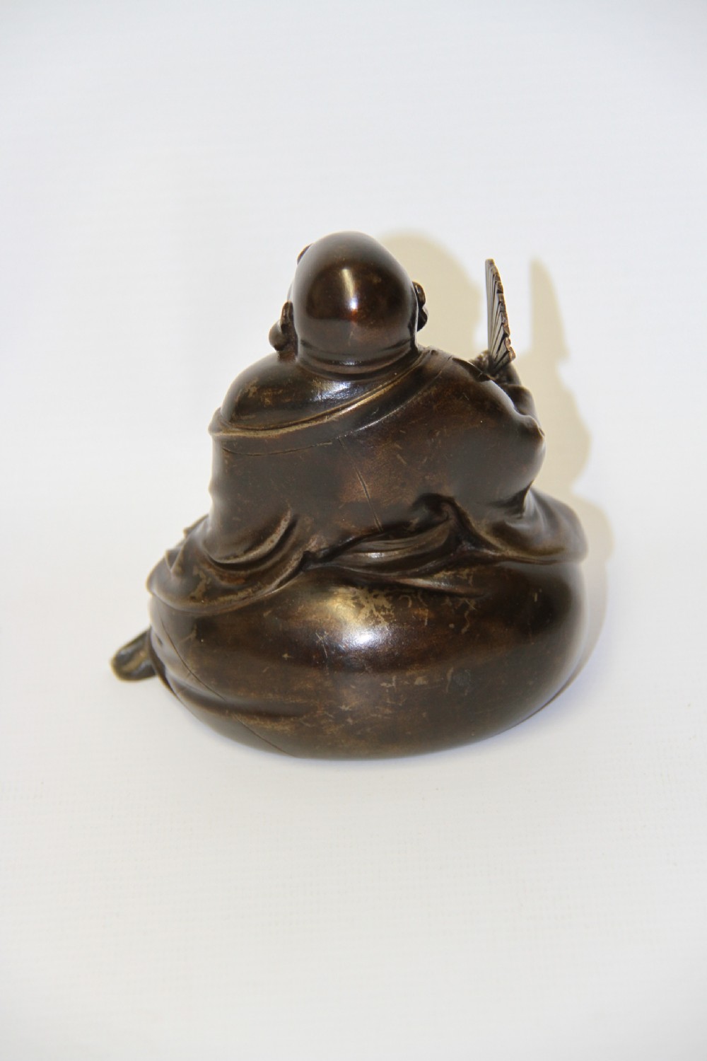A humorous late 19th century bronze okimono  View VIII