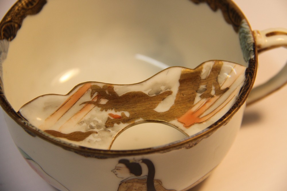 A rare Japanese Moustache Cup and Saucer View VII