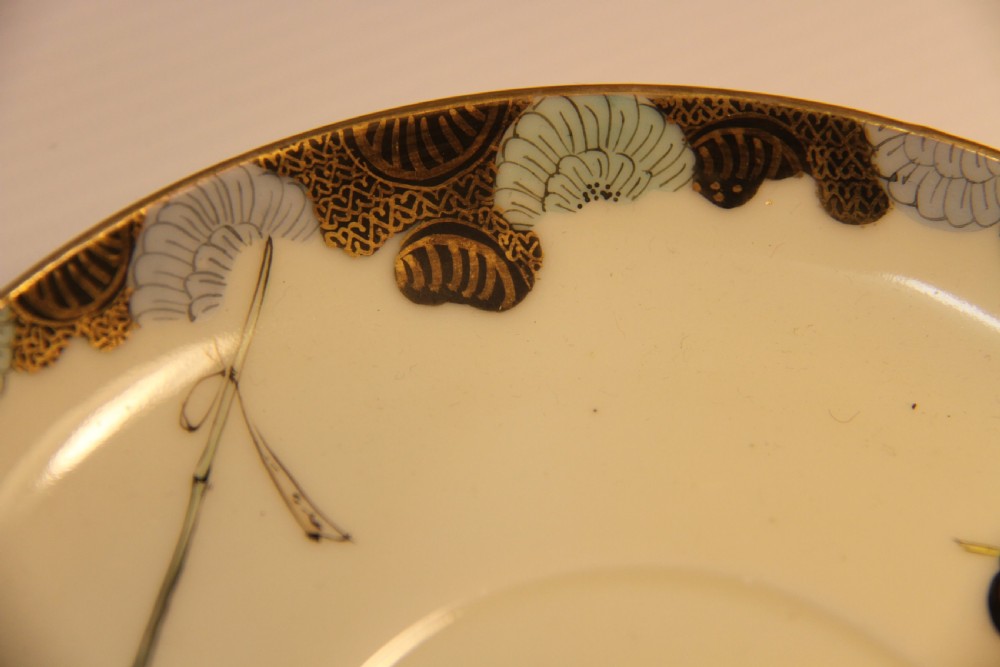 A rare Japanese Moustache Cup and Saucer View IX