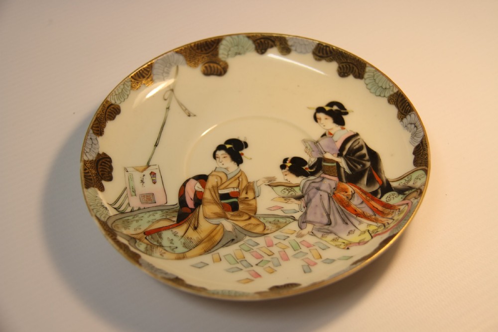 A rare Japanese Moustache Cup and Saucer View XI