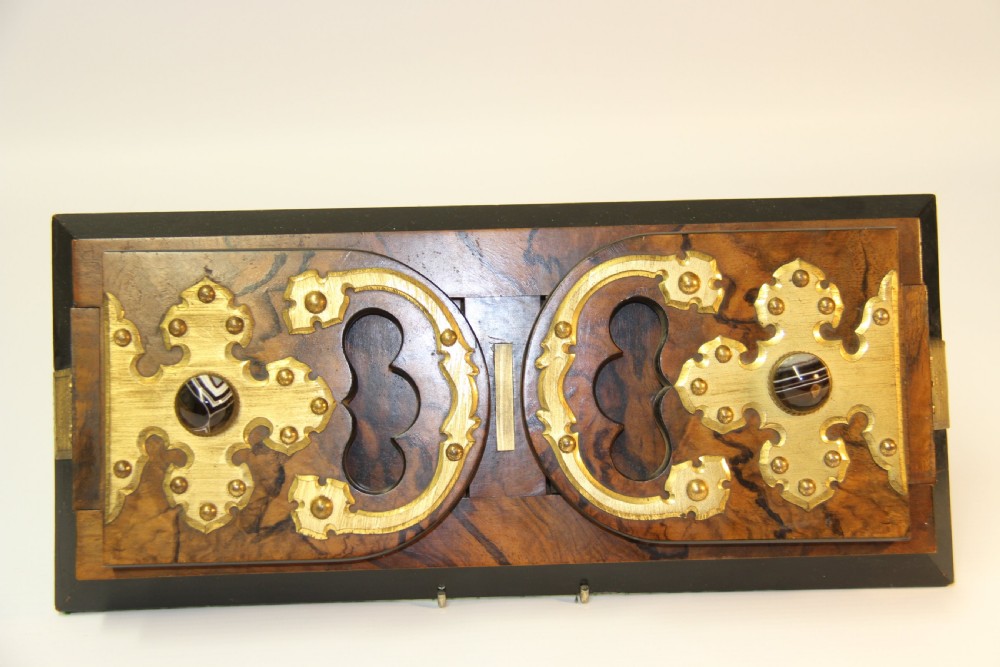 A fine Betjemann's  patent Self Closing Book Slide View II