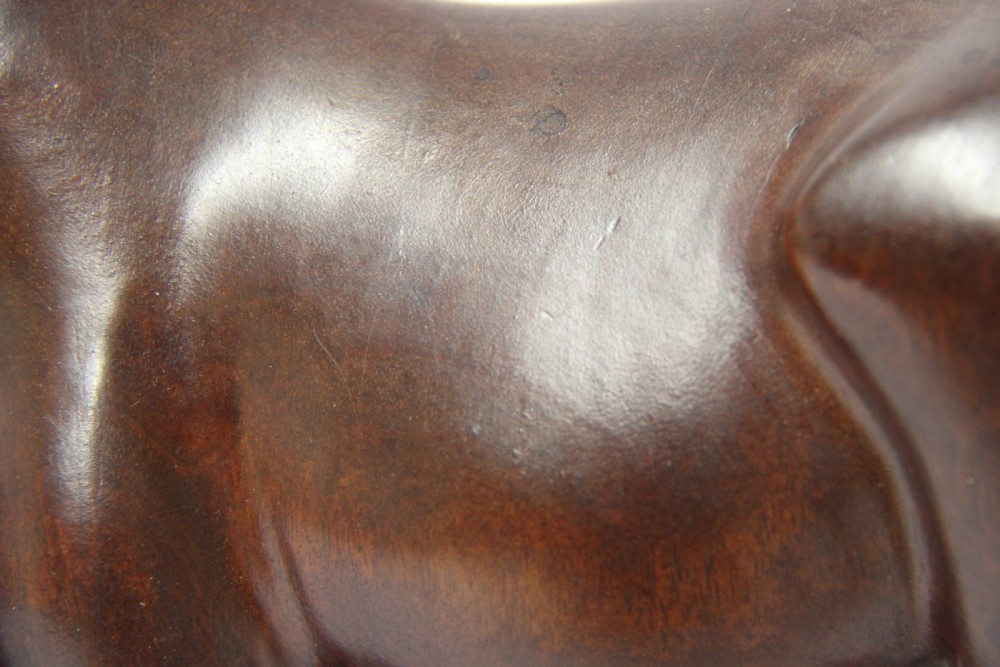 A 19th century Chinese carved hardwood study of a Horse View II