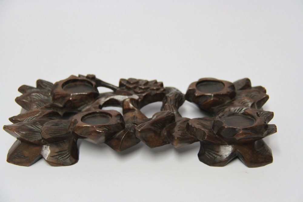 A 19th century Chinese carved hardwood study of a Horse View IV