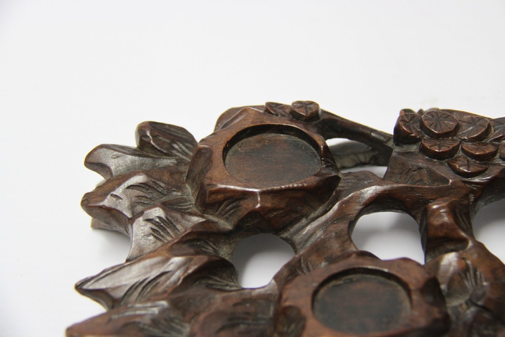 A 19th century Chinese carved hardwood study of a Horse View X