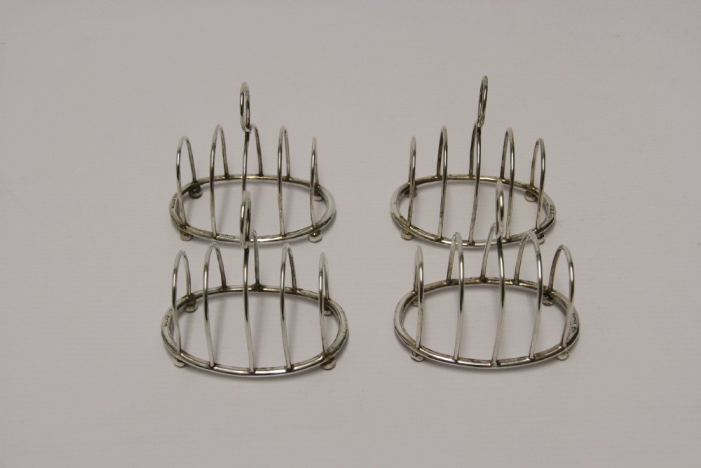 A rare set of four silver toast racks View IV