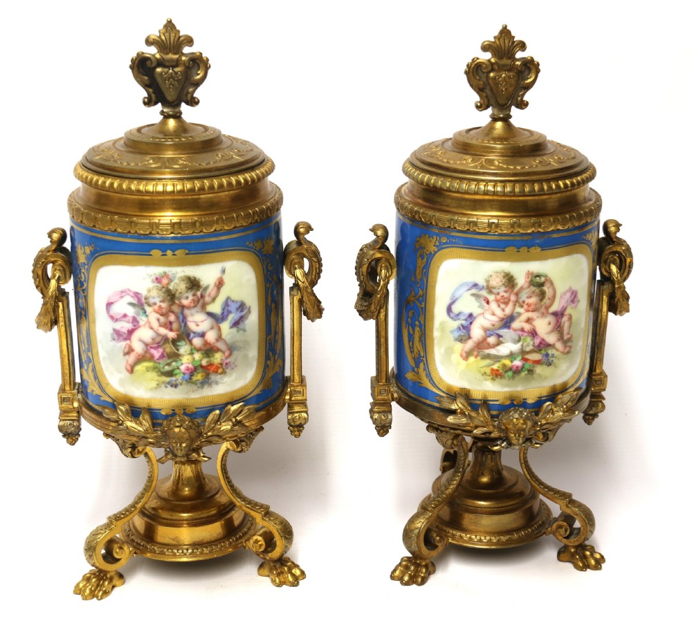A fine 19th century pair of French Sevres style porcelain and ormolu Vases.