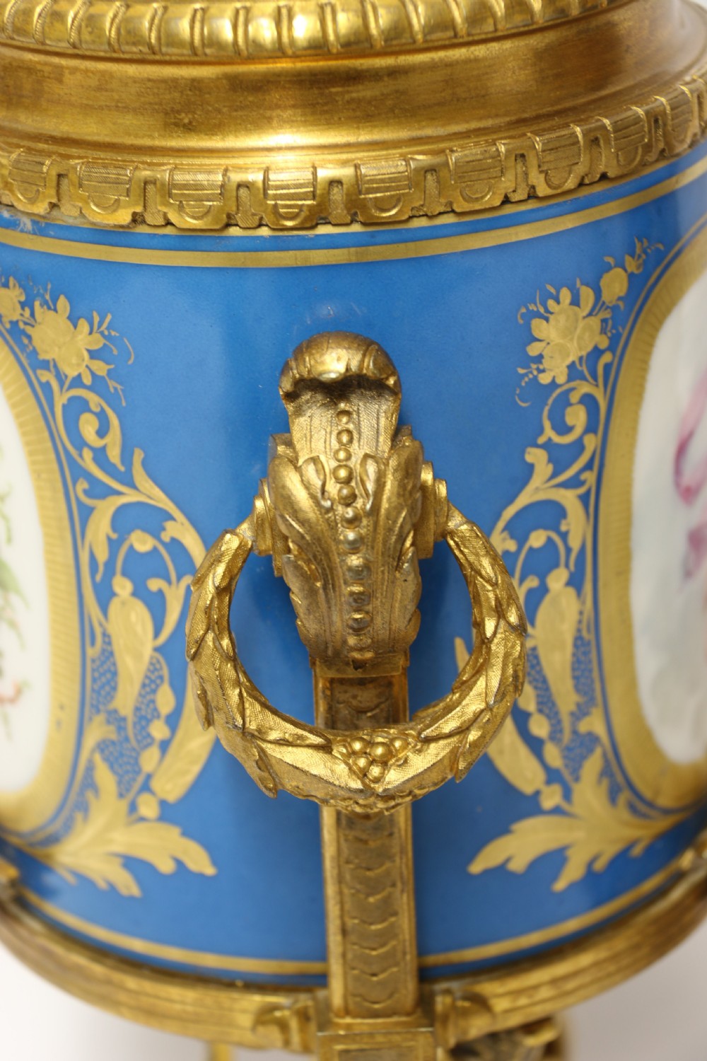 A fine 19th century pair of French Sevres style porcelain and ormolu Vases. View XVI