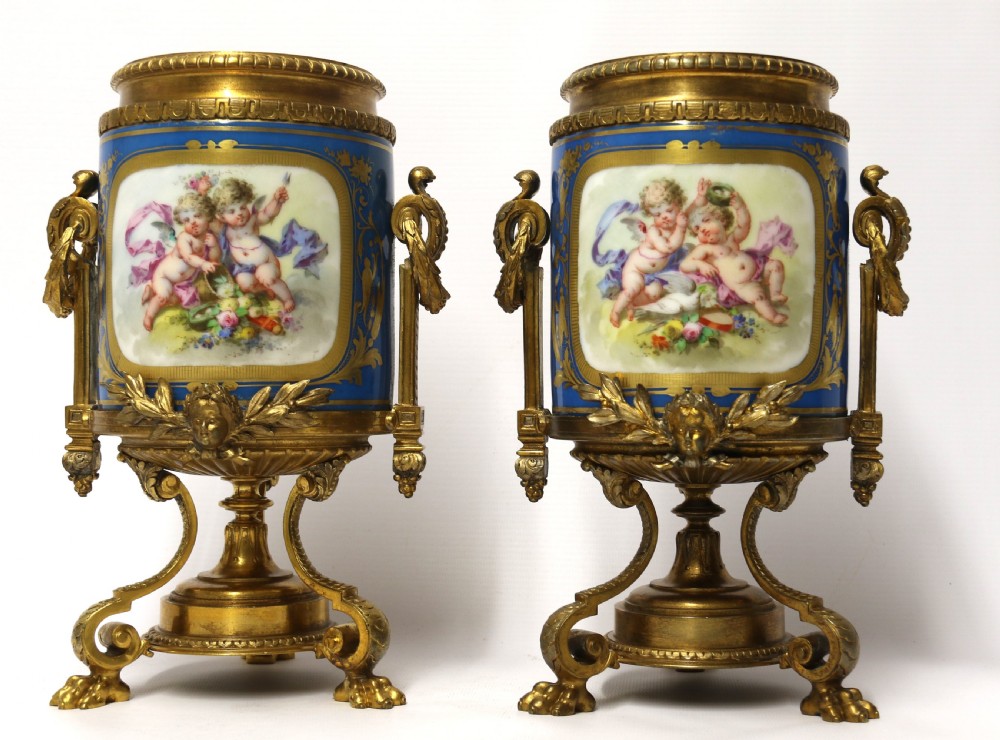 A fine 19th century pair of French Sevres style porcelain and ormolu Vases. View XVIII