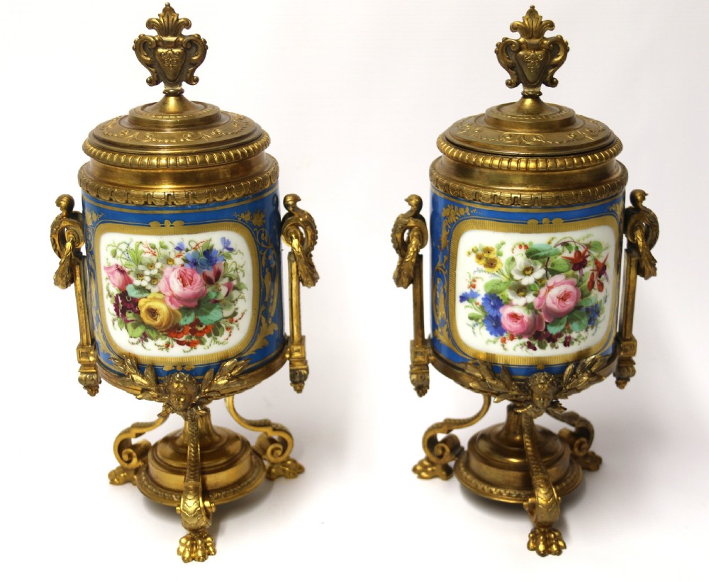 A fine 19th century pair of French Sevres style porcelain and ormolu Vases. View XIX