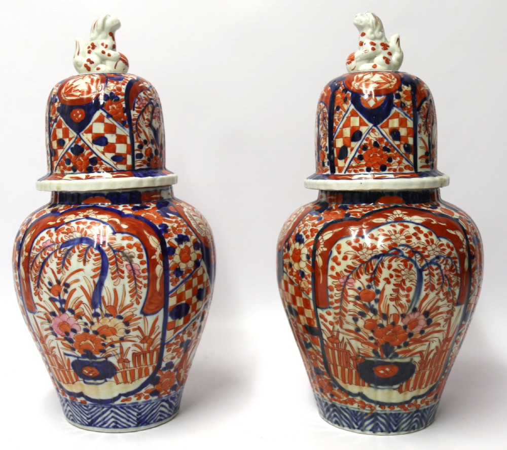 A large pair of Japanese Imari Ginger Jars with covers