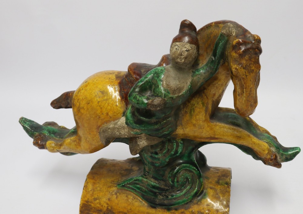 A pair of Chinese pottery ridge tiles View VII