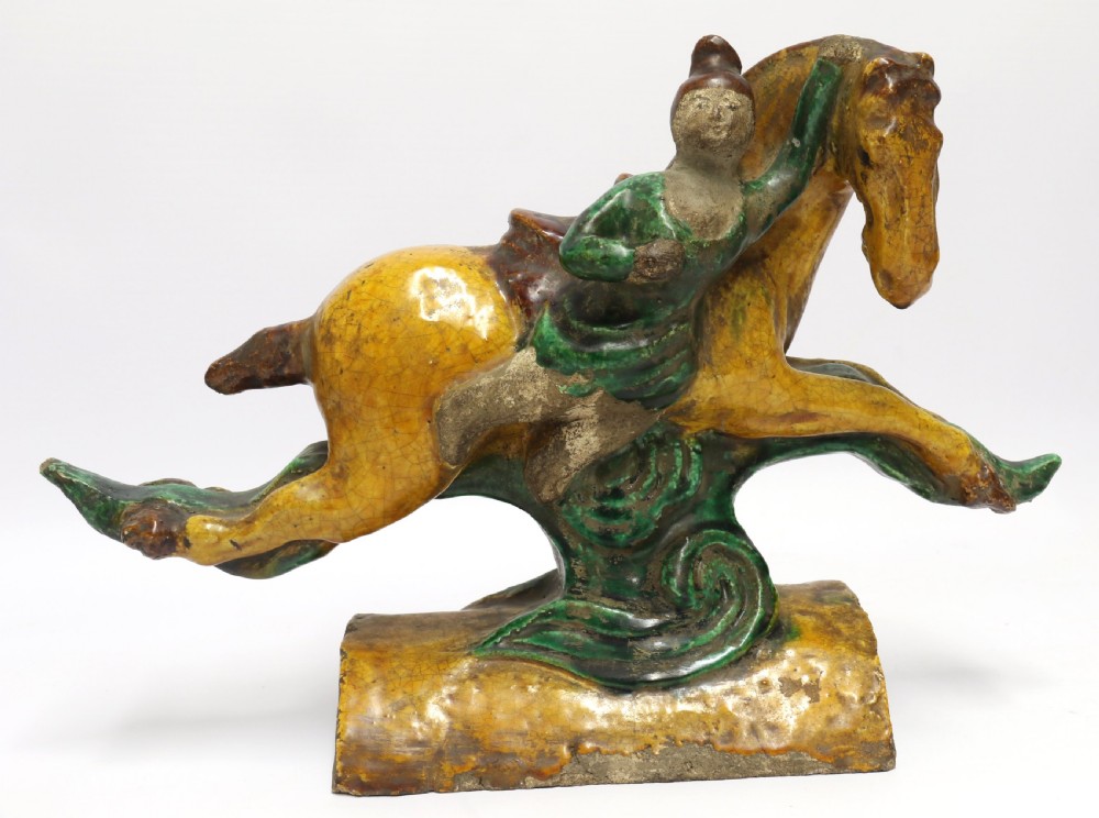 A pair of Chinese pottery ridge tiles View VIII