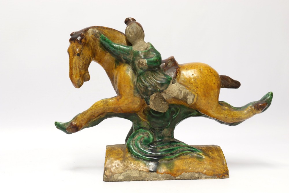 A pair of Chinese pottery ridge tiles View IX