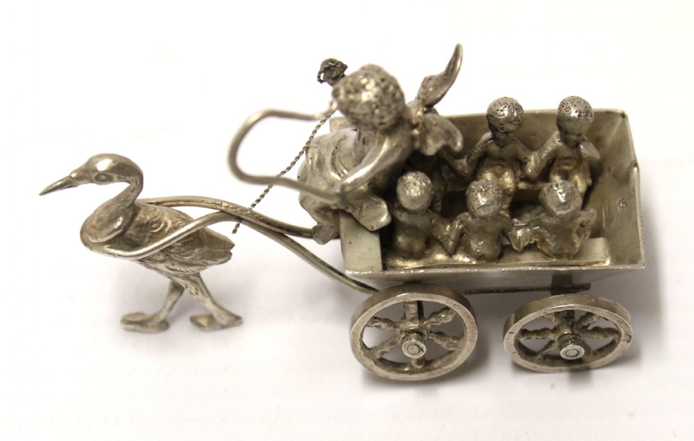 Miniature Silver figure group with cherub View II