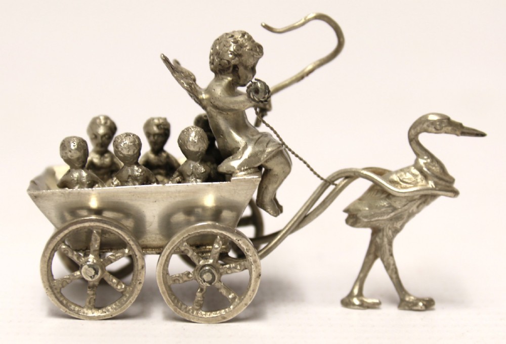 Miniature Silver figure group with cherub View III