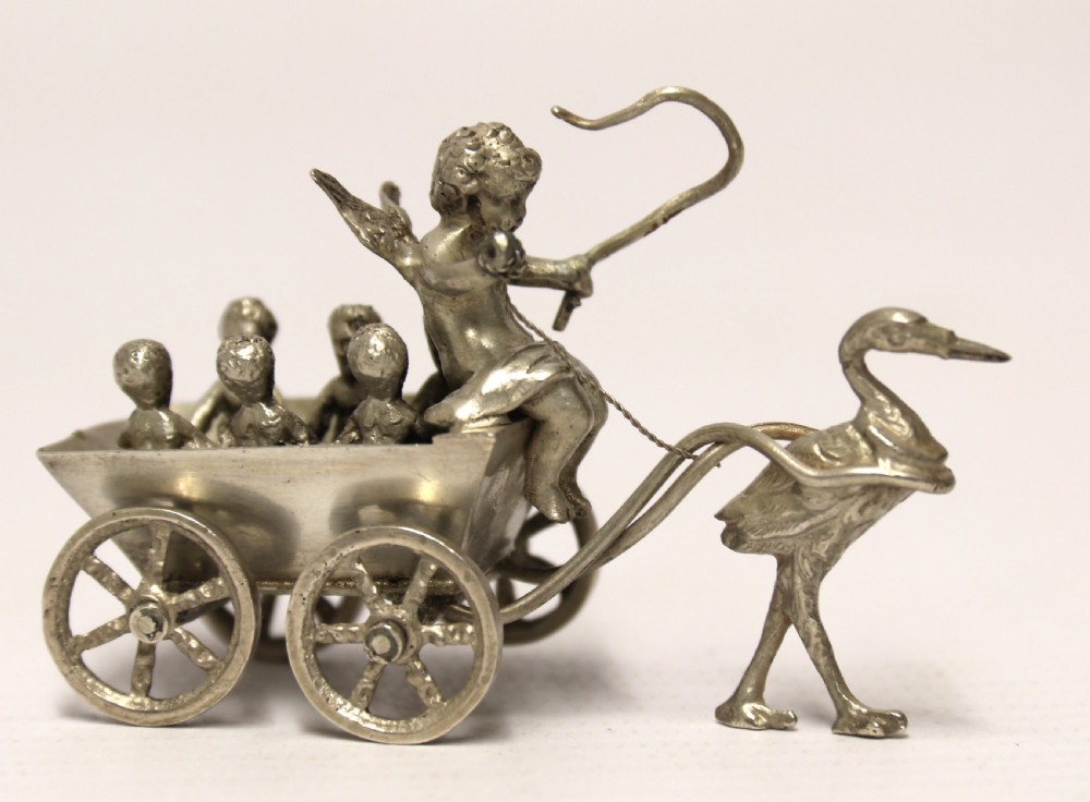 Miniature Silver figure group with cherub View IV