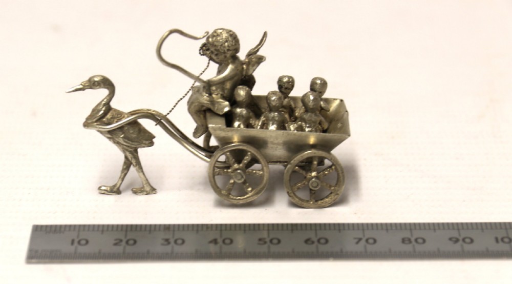 Miniature Silver figure group with cherub View V