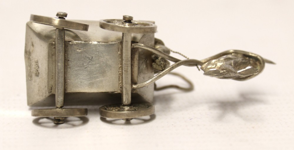 Miniature Silver figure group with cherub View VI