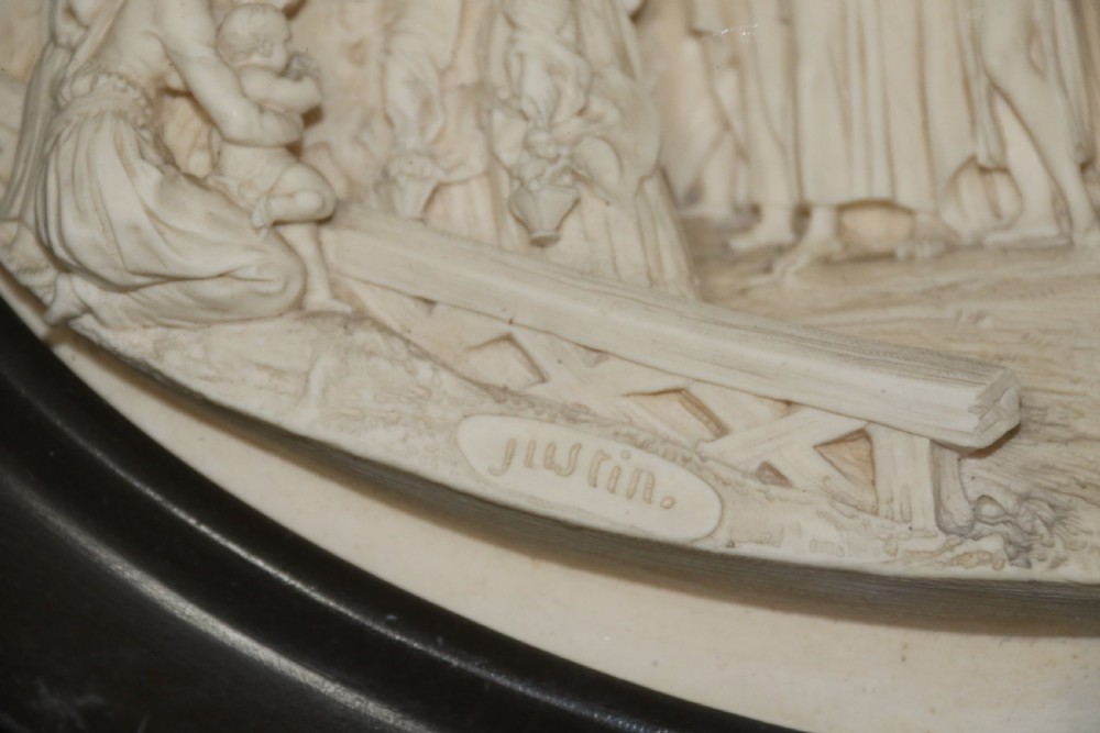 A pair of French oval plaques cast in plaster View VII