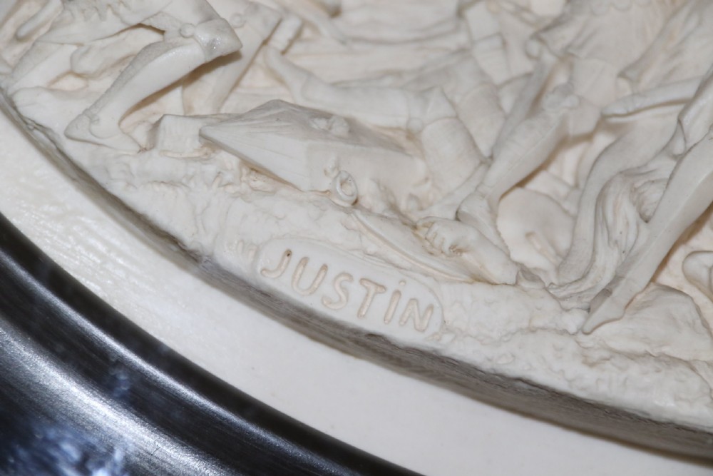 A pair of French oval plaques cast in plaster View IX