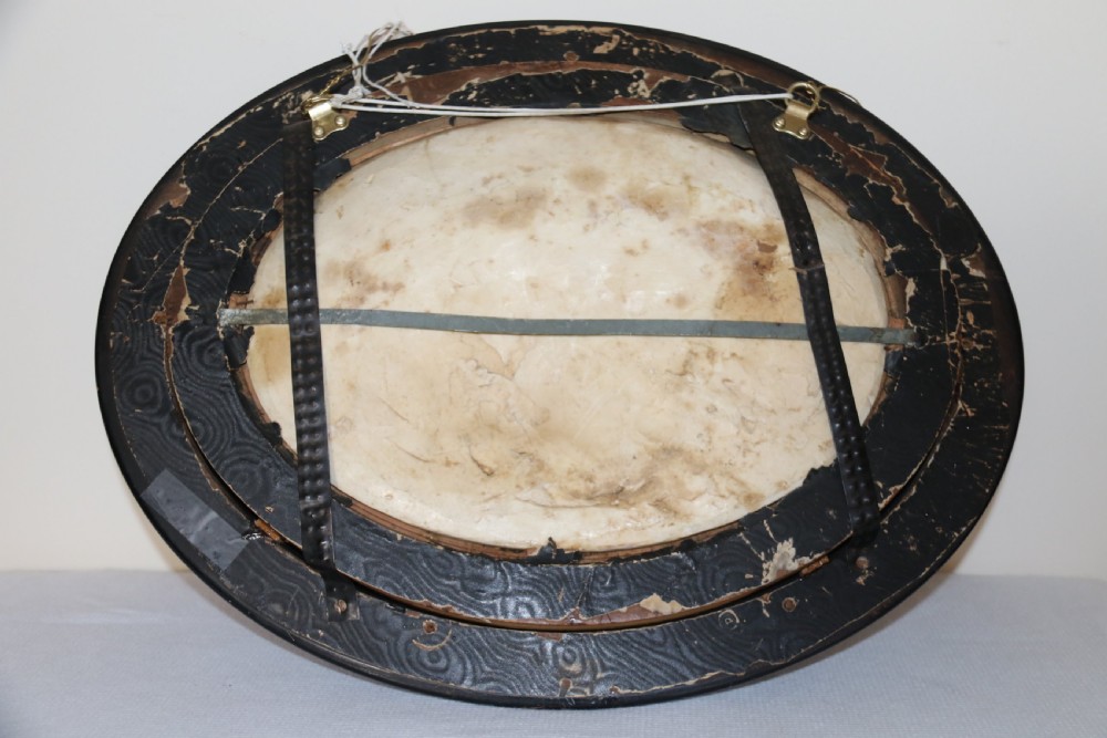 A pair of French oval plaques cast in plaster View XX