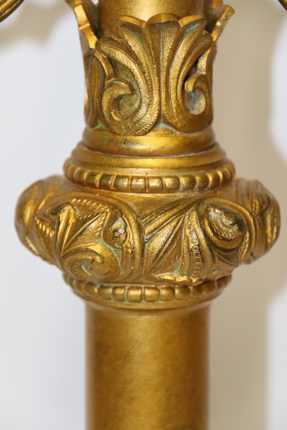 A large pair of Gothic  Gilt brass Candelabra View IX