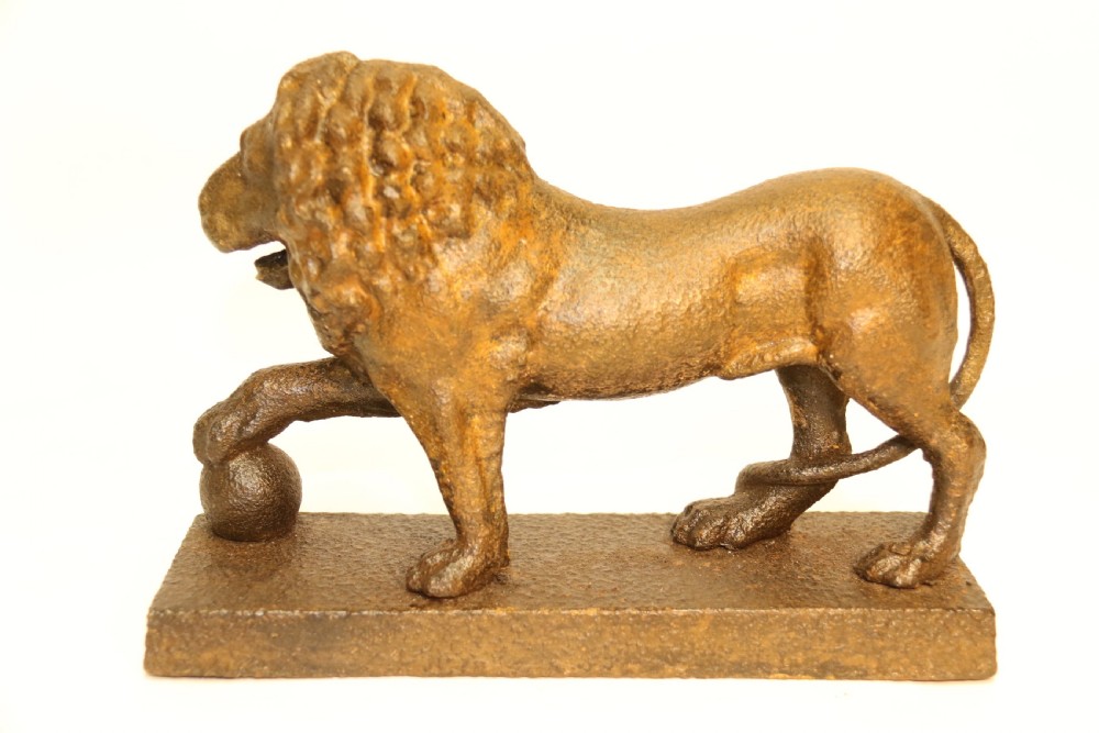 A rare George III Lion Door Stop View VII