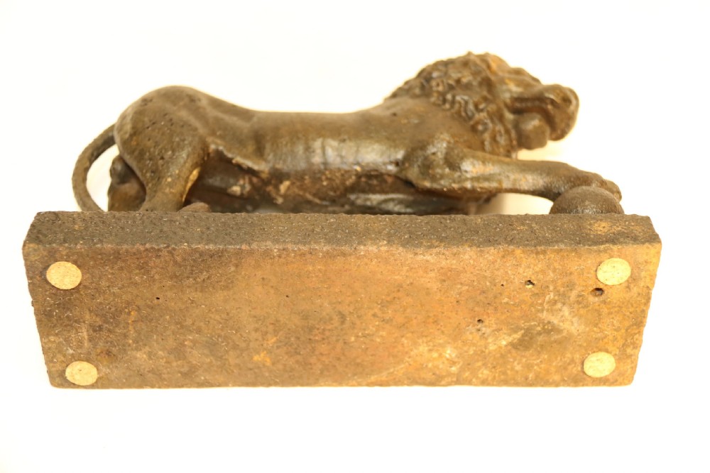 A rare George III Lion Door Stop View VIII