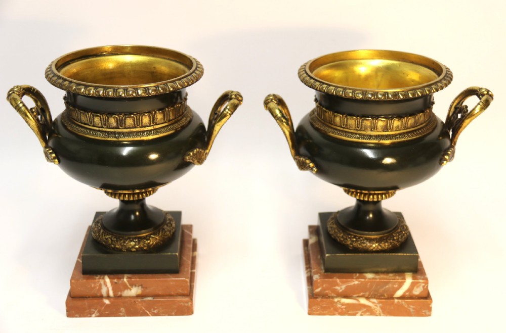 A pair of French bronze urns 19th century