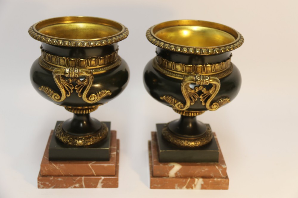 A pair of French bronze urns 19th century View II