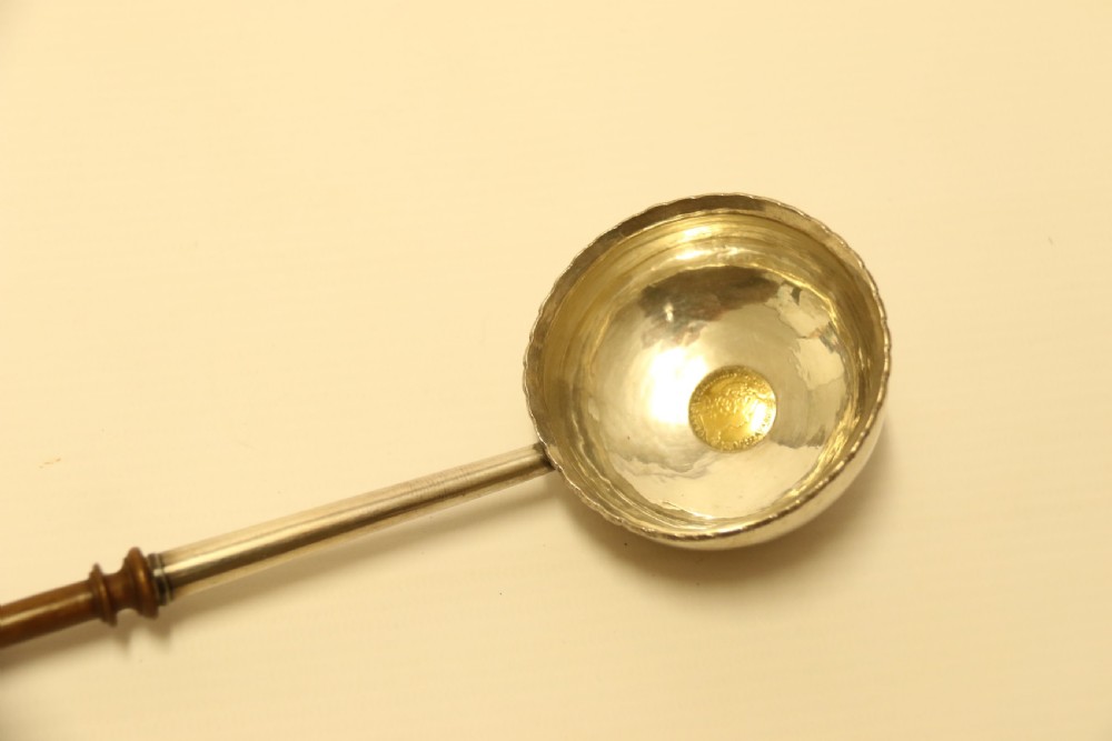 A Georgian Silver Toddy Ladle with inset coin View VII
