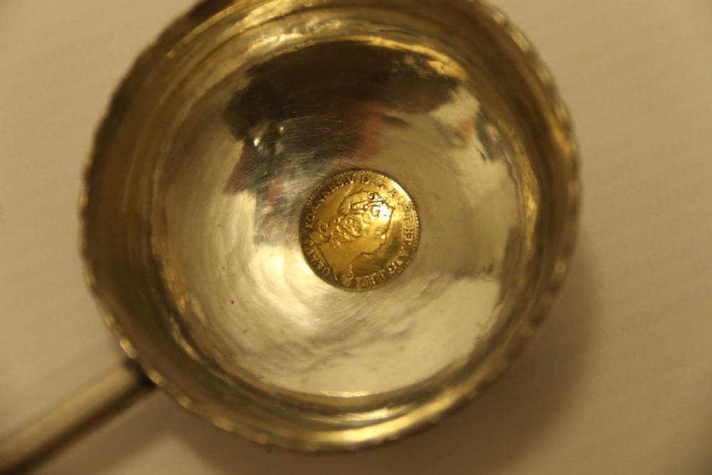 A Georgian Silver Toddy Ladle with inset coin View VIII