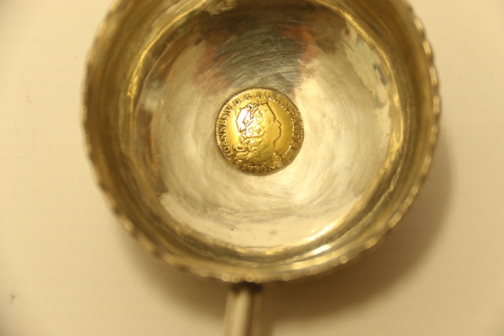 A Georgian Silver Toddy Ladle with inset coin View IX