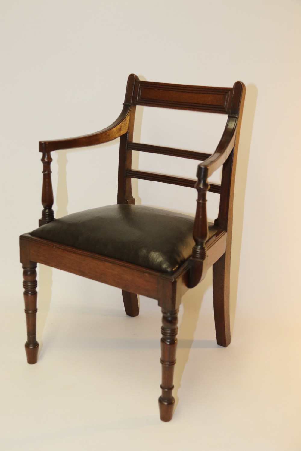 A superb miniature Regency Chair View VI