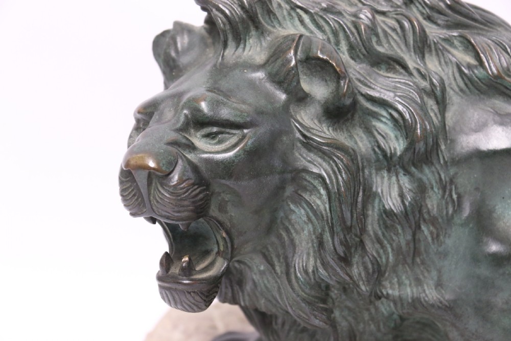 Early 20th century Bronze study of a Lion mounted on limestone base View IV