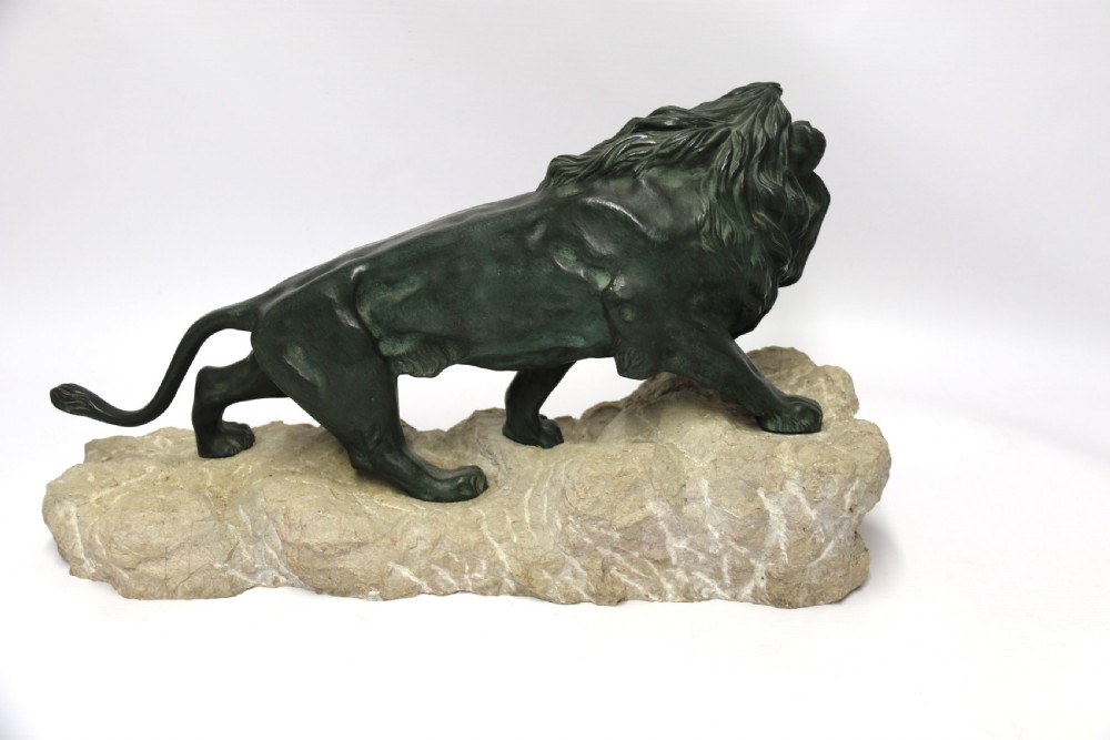 Early 20th century Bronze study of a Lion mounted on limestone base View VI