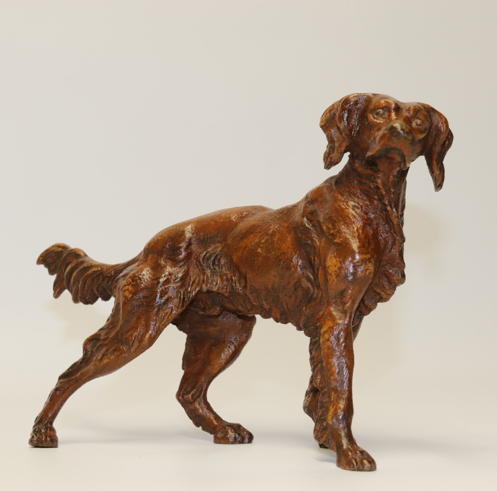 A large Austrian cold painted bronze setter