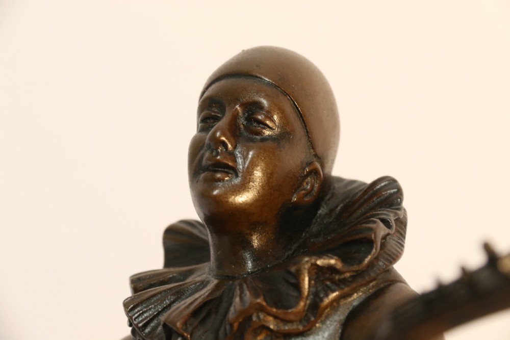 Bronze study of a singing Pierrot signed Raphael View XI