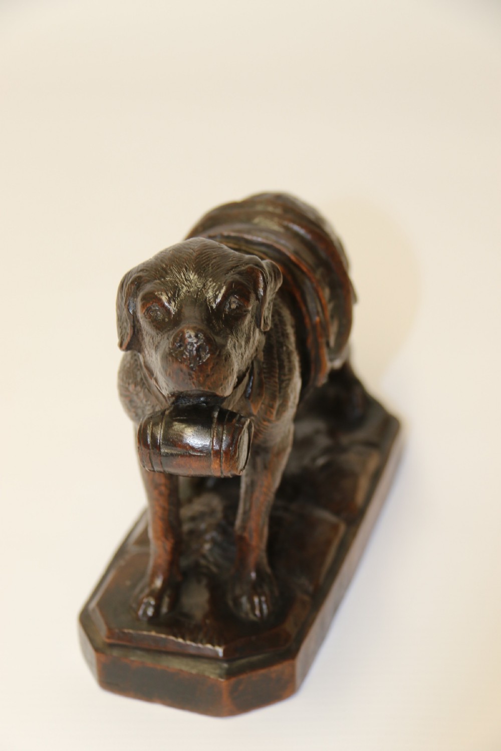 A fine study of a Black Forest carved walnut St Bernard Rescue Dog View XI