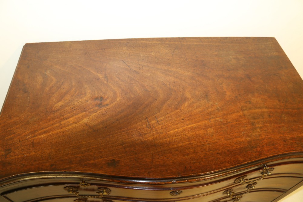 A Chippendale period Serpentine Fronted Mahogany Chest of Drawers View III