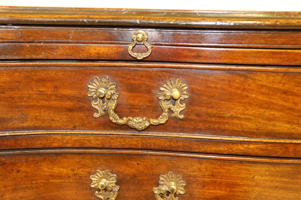A Chippendale period Serpentine Fronted Mahogany Chest of Drawers View IV