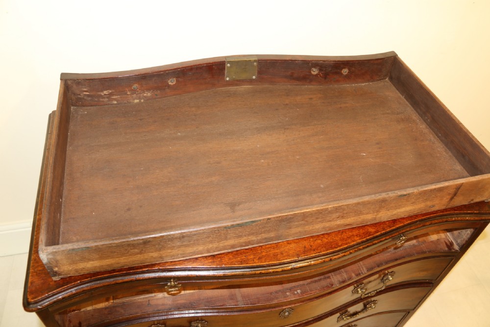 A Chippendale period Serpentine Fronted Mahogany Chest of Drawers View XVI