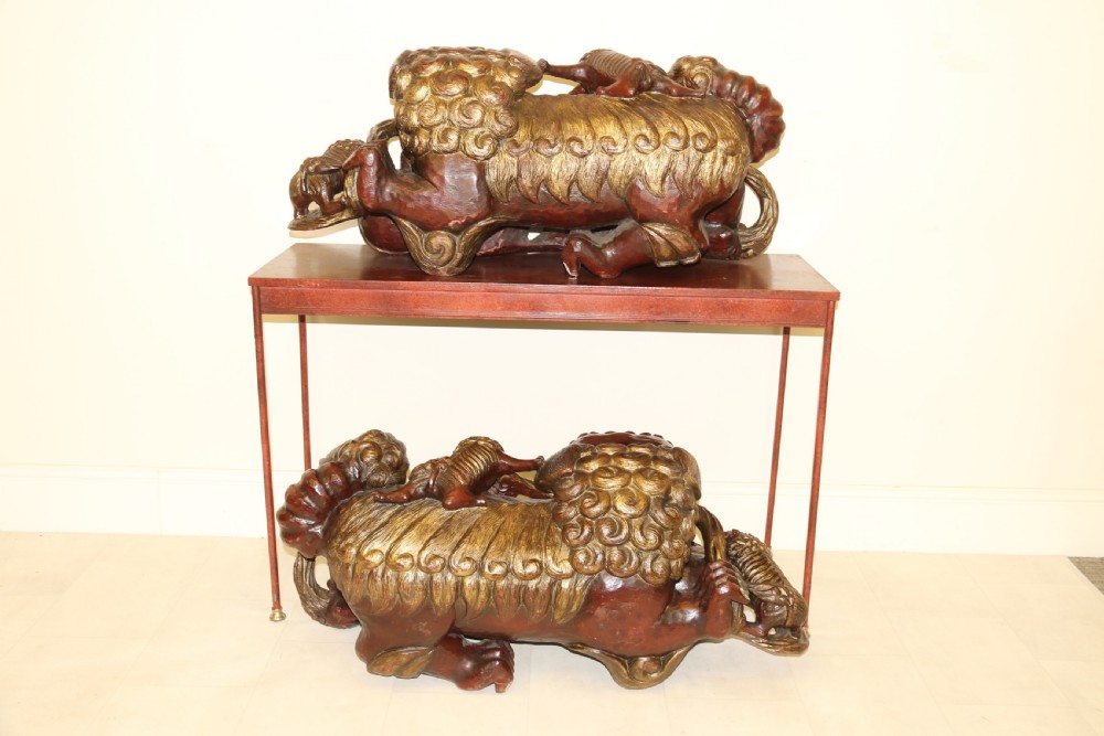 A rare pair of Chinese Mythical Beasts/Dogs of Foo on Stands View XIII